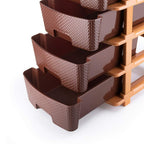 Lifestyle shot of the brown plastic drawer system in a modern living space.