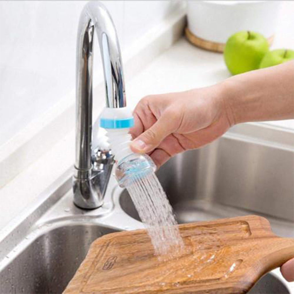 Flexible faucet shower head installed on a kitchen sink, demonstrating 360° swivel.