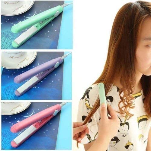 A hand holding the compact ceramic mini hair styler, showcasing its portable design.