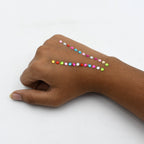 Collection of shining crystal stickers used for jewelry making and school projects.