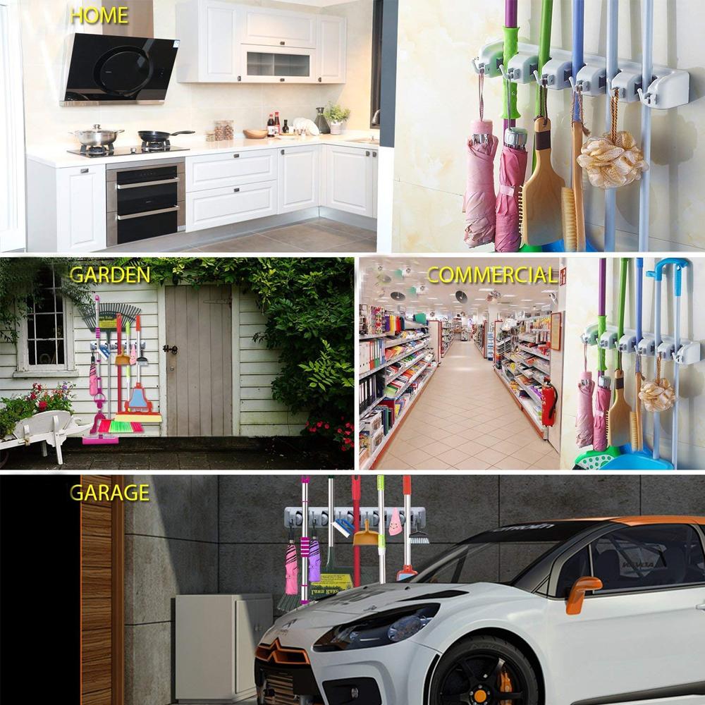 Installation view of the space-saving wall mounted mop and broom storage system.