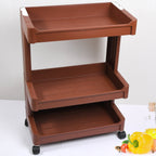 Plastic serving trolley with smooth-rolling wheels for convenient home use.