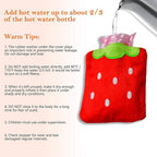 Small heating water bag with a charming strawberry print on a clean surface.