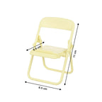 Sleek chair-shaped phone holder for convenient hands-free mobile usage.