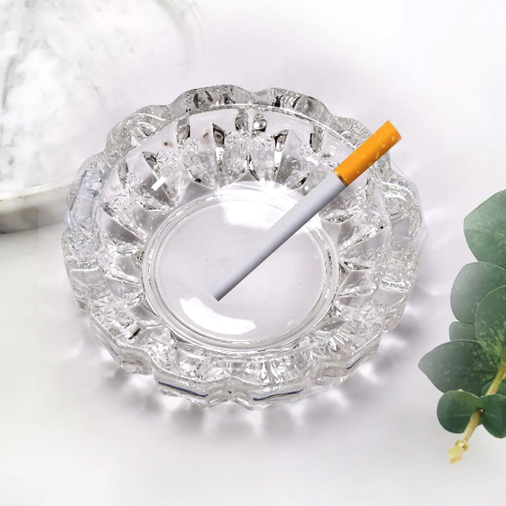 Heavy-duty crystal glass ashtray, designed for longevity and easy cleaning.