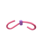The Thigh Toner positioned next to other gym equipment, highlighting its compact size.
