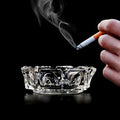 Sanford round cigar ashtray, showcasing its clear glass and elegant design.