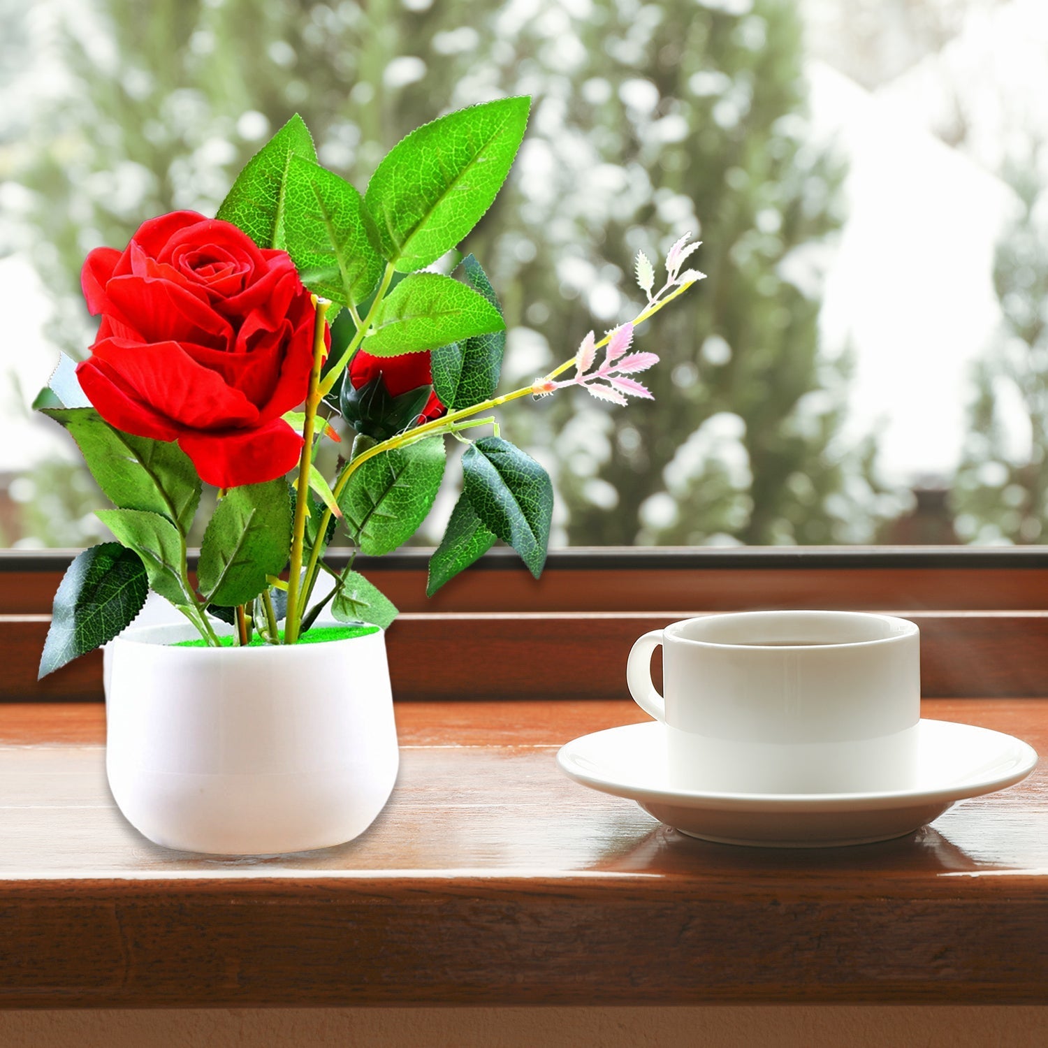 Vibrant red artificial rose plant in a decorative pot, perfect for home decor.