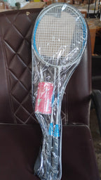 Full badminton set display showing metal rackets and shuttlecocks