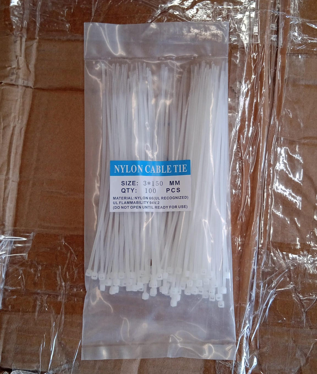 Pack of 100 heavy-duty black zip ties, 6 inches, for versatile use.
