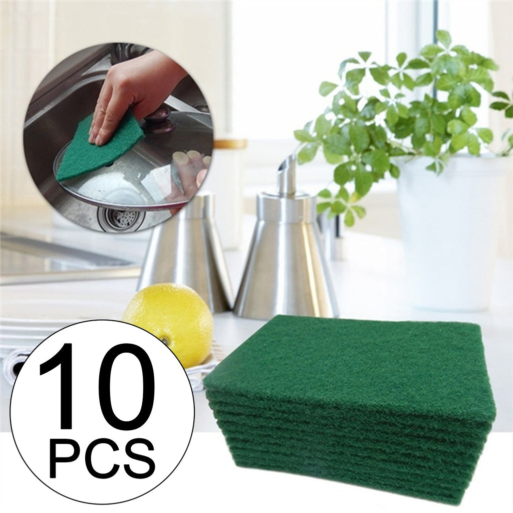 Durable green kitchen scrubber pads stacked, showcasing their texture for effective dirt removal.