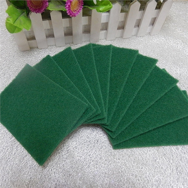 Green kitchen scrubber pads in a 10-pack, ready for multipurpose cleaning tasks.