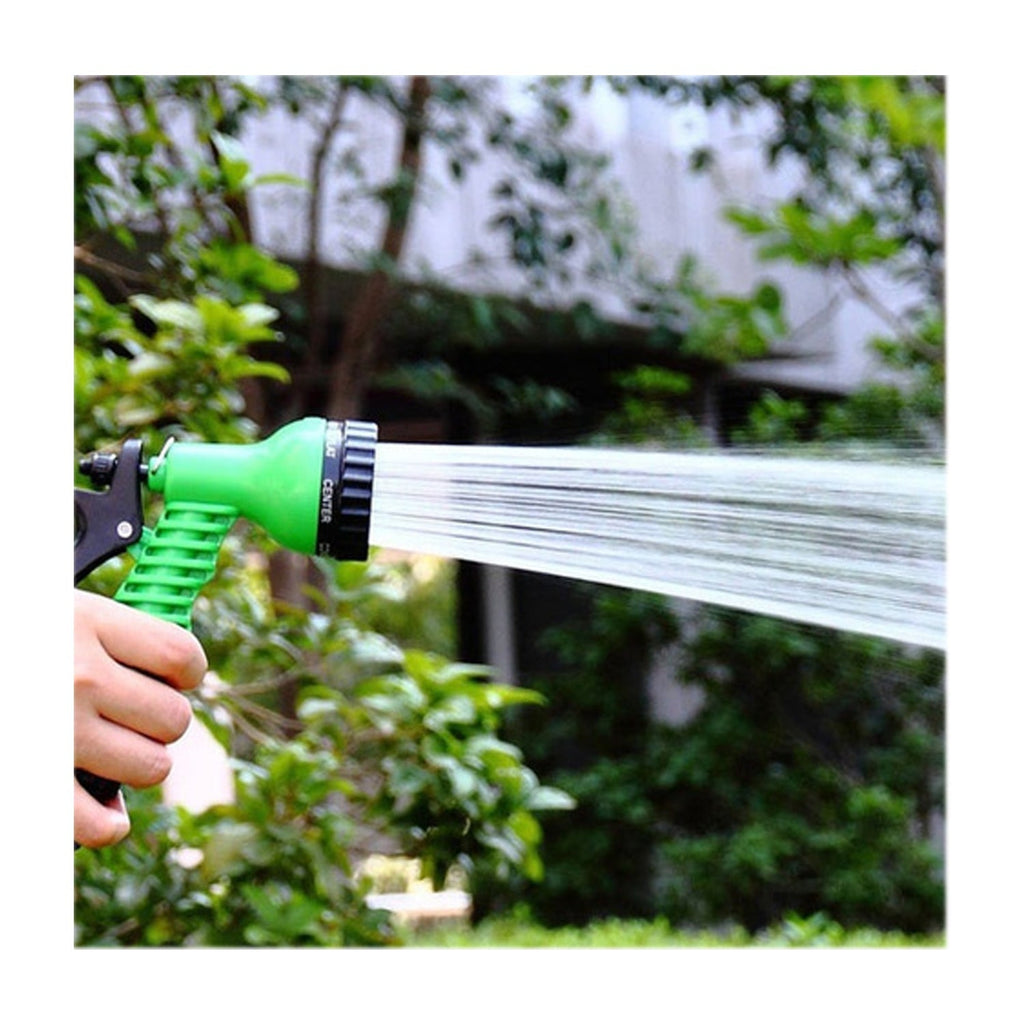 Detailed view of the garden hose nozzle's quick connect mechanism.