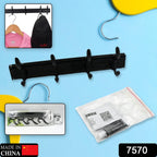 Close-up view of the durable metal hooks on the wooden wall mount coat hanger.
