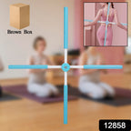 Woman demonstrating proper use of the yoga stick for opening shoulders and improving posture.