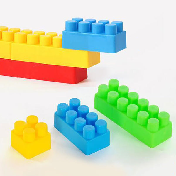 Loose small building blocks in assorted colours, ready for imaginative play.
