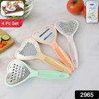 Close-up of the sharp stainless steel blades on the Heart Grater Slicer for efficient food prep.