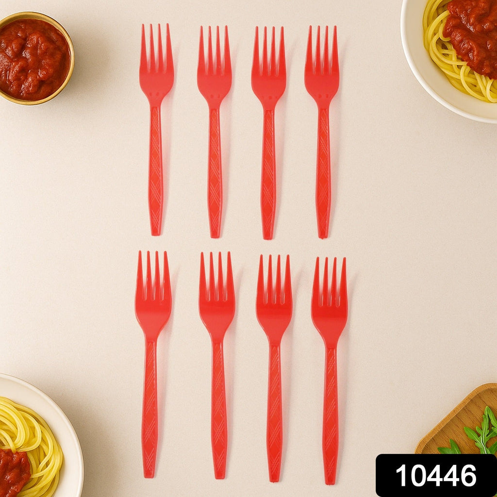 Close-up view of red disposable plastic forks showing sturdy design