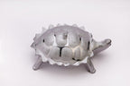 Stylish tortoise-shaped container, ideal for serving snacks.