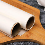 Unrolled non-stick baking paper showing its smooth, grease-resistant surface.