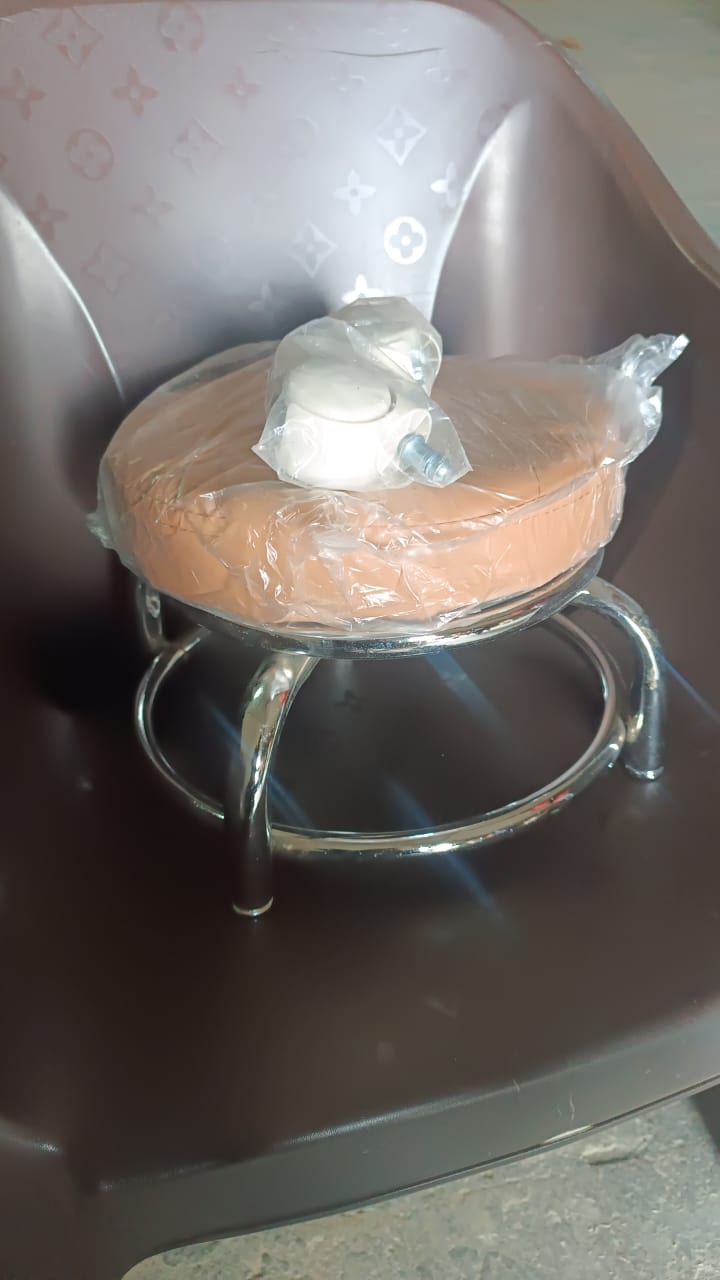 Heavy duty rolling stool with sturdy steel base and comfortable cushioned seat