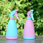 Demonstration of the water spray bottle's adjustable nozzle for various spray patterns.