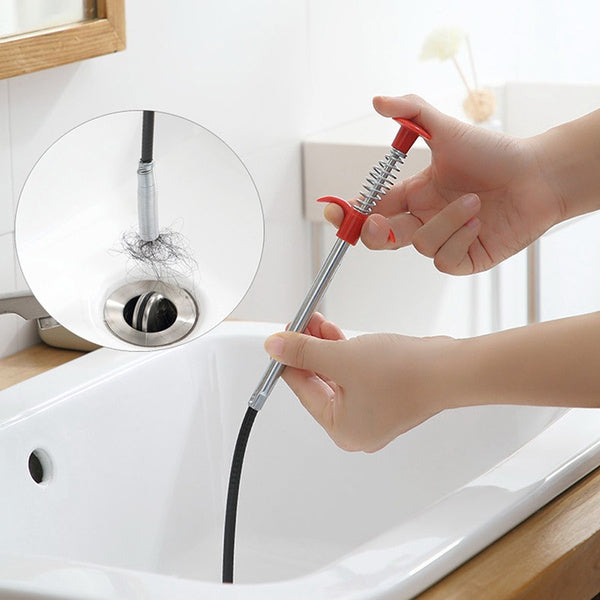 Detailed view of the drain cleaner tool's claw mechanism for grabbing stubborn clogs.
