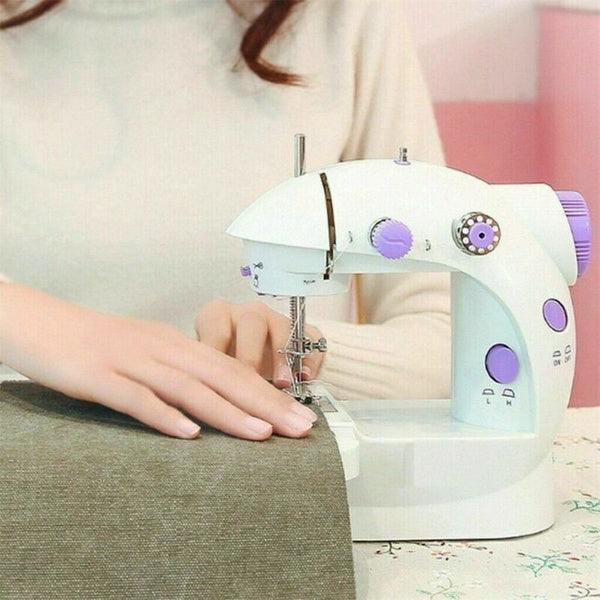 Compact mini sewing machine with dual speed control for tailoring projects.