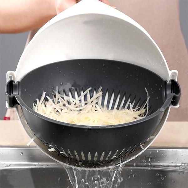 Freshly cut vegetable slices being efficiently drained in the integrated rotating basket of the food chopper.
