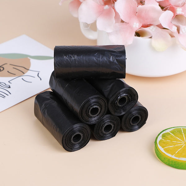 Large black garbage bags, 30 x 50 inch, for effective waste disposal.
