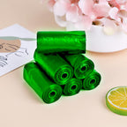 Biodegradable green corn starch trash bags designed for eco-conscious waste management.