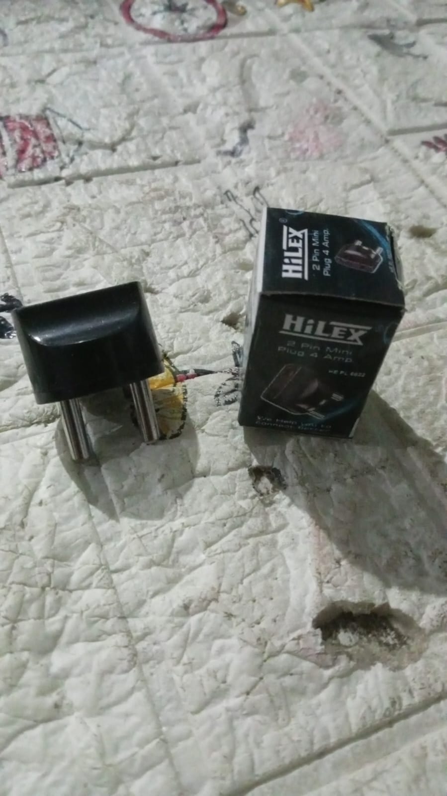 Multiple  2 Pin Plug Adapters arranged on a surface, ready for use.