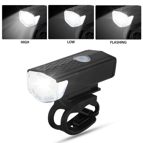 LED bike headlight with USB charging cable attached.