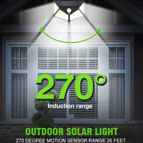 Stylish solar-powered security lamp enhancing a garden entrance.