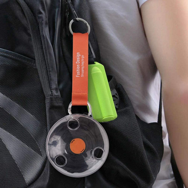 Foldable reusable shopping bag with groceries visible inside, ready for transport.