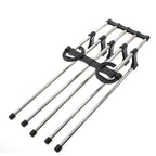 Multiple Organivo trouser hanger organizers stacked for maximum wardrobe organization.