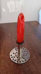 Side angle of stainless steel vegetable masher