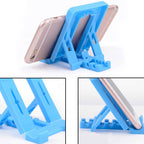 A practical desk phone holder made of robust plastic, part of the 50-piece wholesale phone holder set.