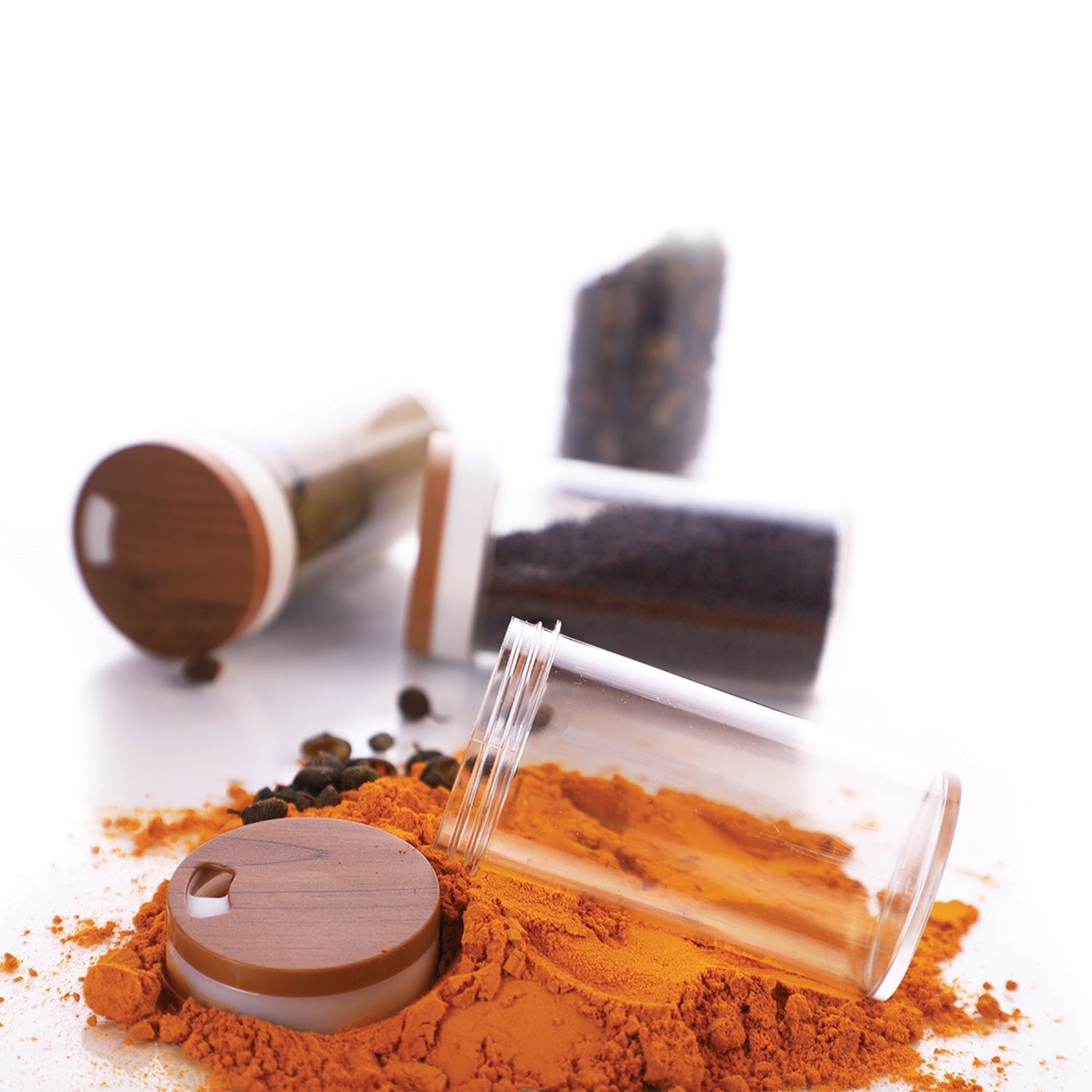 Detailed shot of the Ganesh 12-jar revolving spice rack, emphasizing its easy-access design.