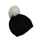 Black fur lined beanie cap featuring a unique skull pattern for an edgy look.