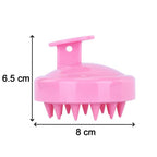 Scalp massager shampoo brush in a bathroom setting, ready for use.