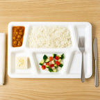 Multi-section plastic serving tray designed for neat portion control and easy cleanup.