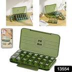 Close-up of the 21-grid portable medication dispenser with individual lids for each day.