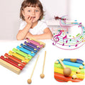 Colorful wooden xylophone toy with 8 metal keys and a mallet, perfect for kids.