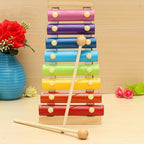 Child-safe wooden xylophone musical instrument, featuring a sturdy frame and colorful keys.