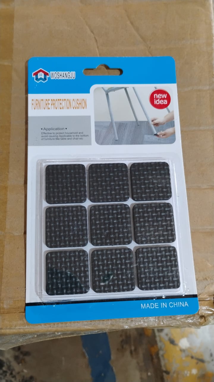 A square furniture pad clearly showing its strong adhesive backing for easy stick.