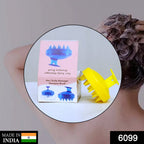 Close-up of the flexible silicone bristles of the scalp massager brush.