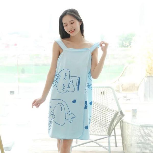 Woman wearing a soft, quick-dry cotton wearable bath towel after shower.