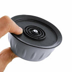 Close-up of a single shock-absorbing anti-walk pad, showing its robust rubber and PVC construction.