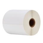 Multiple rolls of 4x6 inch shipping thermal labels on a shelf.